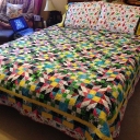 Finished Grand Illusion - quilted, bound, washed, dried, and put on my bed!  Whew!!!