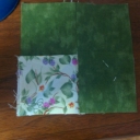 This is the first block that I did for the border. Ricky had a video that showed just the flying geese with the fast way in month 12 video. well I sandwiched the  light colored fabric that is folded 4 1/2 x 2 1/2 between the green 4 1/2 x 2 1/2 . now I have my border with only one seam.