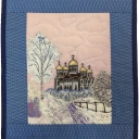 "Russian Church" by Braguup Poccyk. This is made by a Russian quilter. The label is handwritten in Russian and very difficult to decipher so the name could be inaccurate. I do know that this mini art quilt depicts a Russian church from her area.