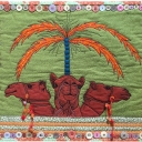 "Cute Camels" by Pam Holland, Adelaide, Australia. Pam is internationally known for her wonderful artistic quilts. This small wall quilt features three camels, embellishments, and loads of buttons. Remember that low-lying embellishments are okay.