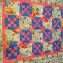 Kendra\'s Raffle Quilt - My niece Kendra is 2 and she has leukemia. We are having a fund raiser for her April 21st and this is the quilt I made to be raffled off. It started off as just a small quilt just a little over a crib size. Well now it is larger then the size you would put on a twin size bed. I am very pleased with the way it turned out. I love everything about this quilt.