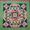 Anniversary Mystery Quilt designed by Carol Doak - Carol Doak provided a cutting list and suggestions for the number of warm and cool colors needed in light, medium and dark. It\'s made from 3 block patterns.