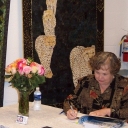 My book is out - I'm thrilled! - Here's a photo from my first book signing party, given by Brenda at Scottie Dog Quilts. Email me if you're interested in a signed copy of the book. "Parade" in the background.