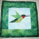 Christine\'s Thankyou Bird - A very small quilt completed as a thank you to my son\'s roommate for giving up her room for a week while I visited. A thank you note is embroidered on the back, done with a Bernina Artista.