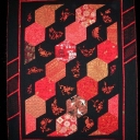 Chinese Hexagons - I digitized and machine embroidered the blocks in this quilt using designs published in 1942. The setting was inspired by a small quilt made by Kitty Pippen. I used a quilting design also by Kitty.