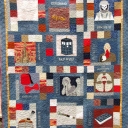 Doctor Who - My Granddaughter is a "Whovian". As a graduation from High School gift, I made her this quilt. The paper piecing was very intricate and some blocks took more than 6 hours to complete. I included 2 pieces of fabric printed and sold by Spoonflower. This fabric "made" the quilt. My setting is orignal.