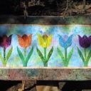 Tulips in a Row - I made this wallhanging for my mom in 2008. The tulip applique was from a purchased pattern.