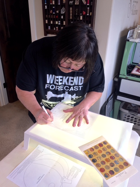 Anna Bates working on her light box