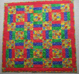 Poppy's first quilt