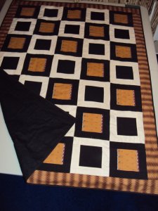 black jean and flannel quilt